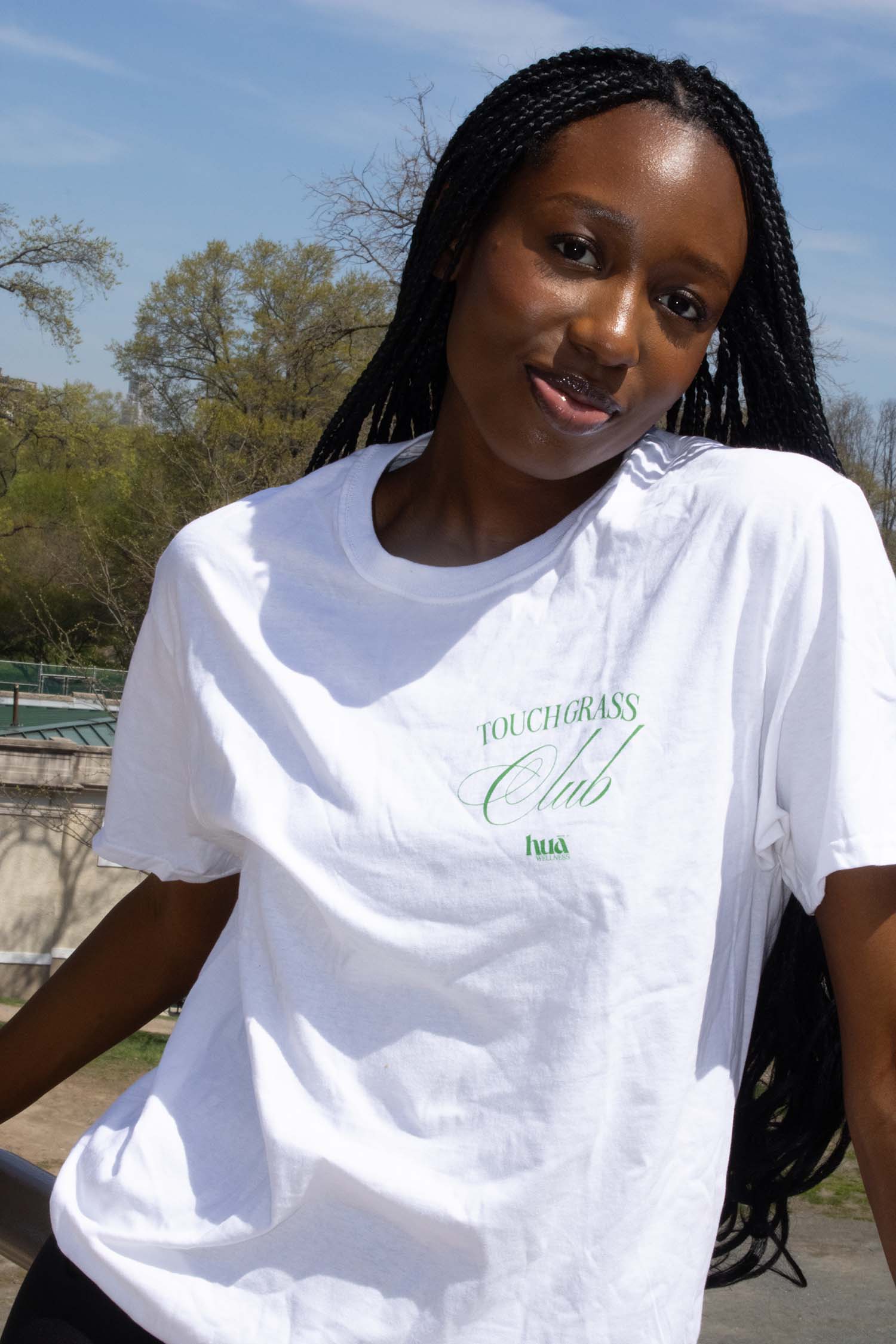 Model wearing Touch Grass Club relaxed