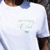 Close up photo of Touch Grass Club t-shirt