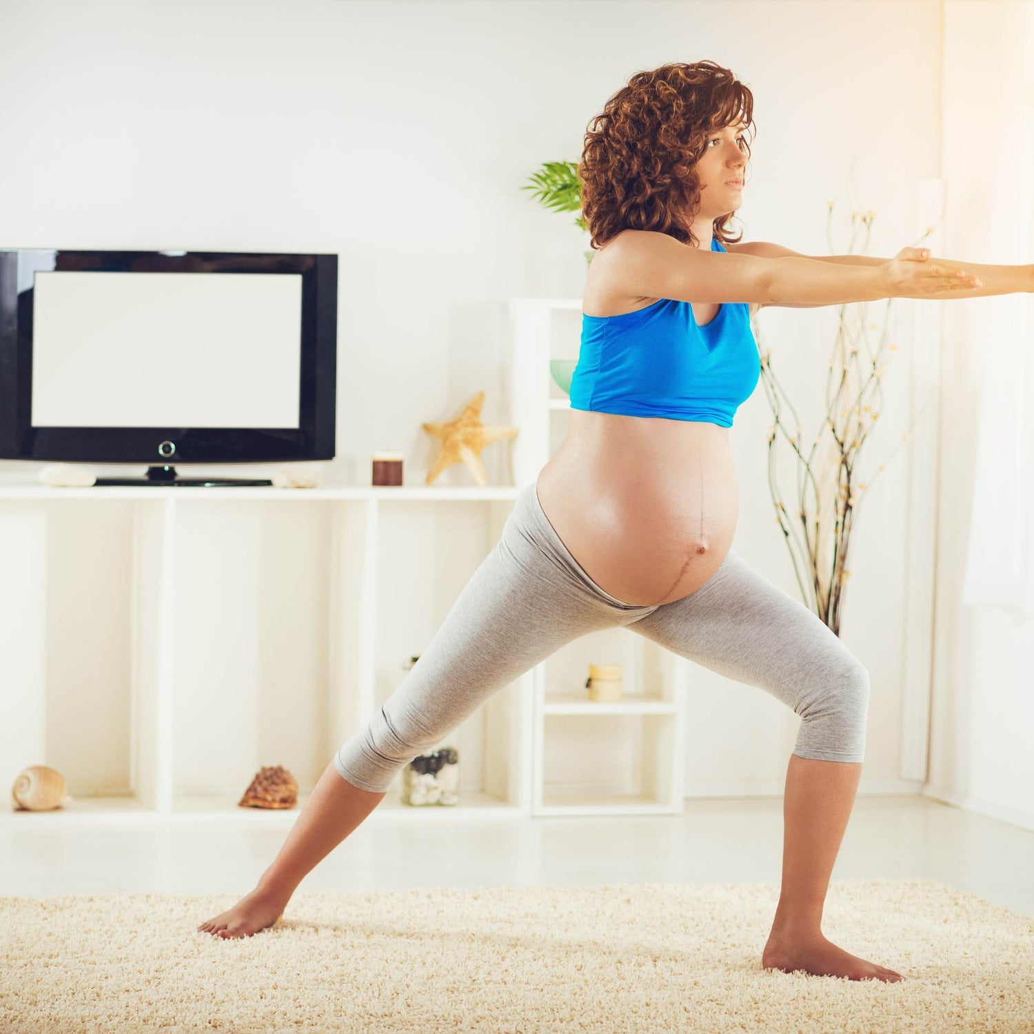 Image of pregnant woman doing yoga