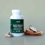 Secondary image of HUA Wellness Organic Mushroom Immune Support supplement featuring mushroom props.